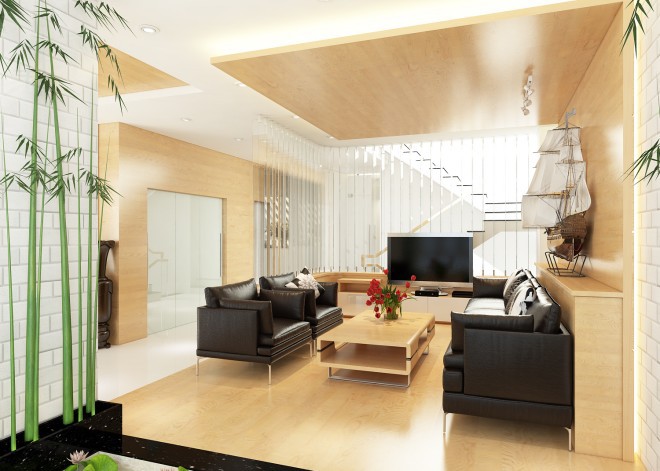 Sofa chất liệu giả da màu đen kết hợp cùng chất liệu gỗ theo phong cách hiện đại tư vấn thiết kế căn hộ