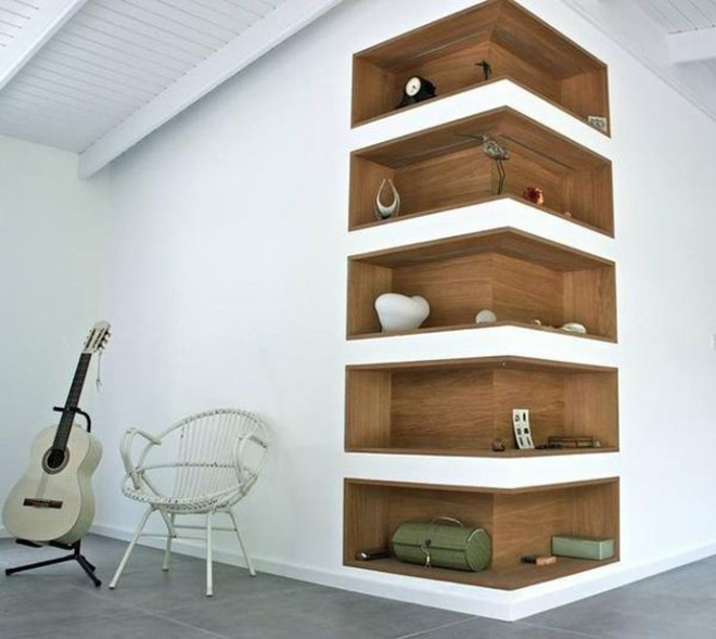 Kiểu tủ âm tường không chỉ giúp tiết kiếm diện tích mà còn tạo nên điểm nhấn cho căn hộ xử lý góc chết trong nhà