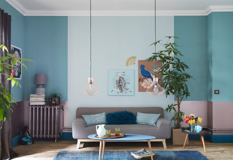 Màu pastel xanh nhạt phối với màu xanh lá cây là gam màu chủ đạo nổi bật của phòng khách Thiết kế