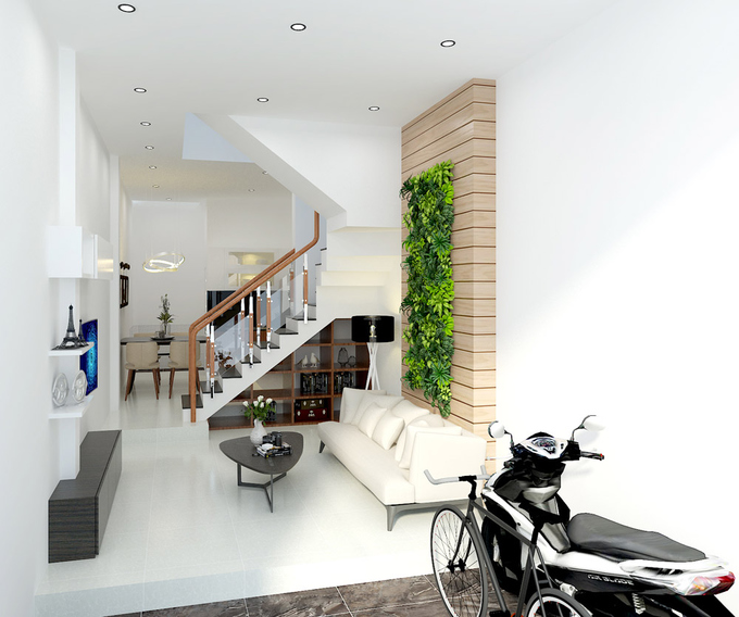Sàn nhà được nâng cao để tách biệt với sân để xe. Gầm cầu thang được tận dụng làm ngăn để đồ Nhà ở đẹp