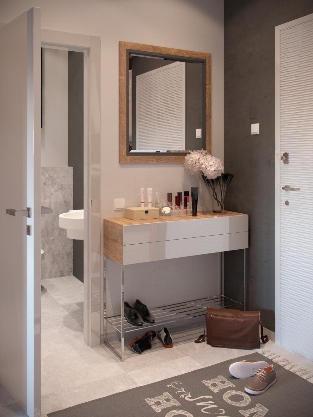 Ở một bên khác của hành lang, một chiếc bàn nhỏ vừa đóng vai trò là bàn trang điểm và kệ để giày Thiết kế đẹp