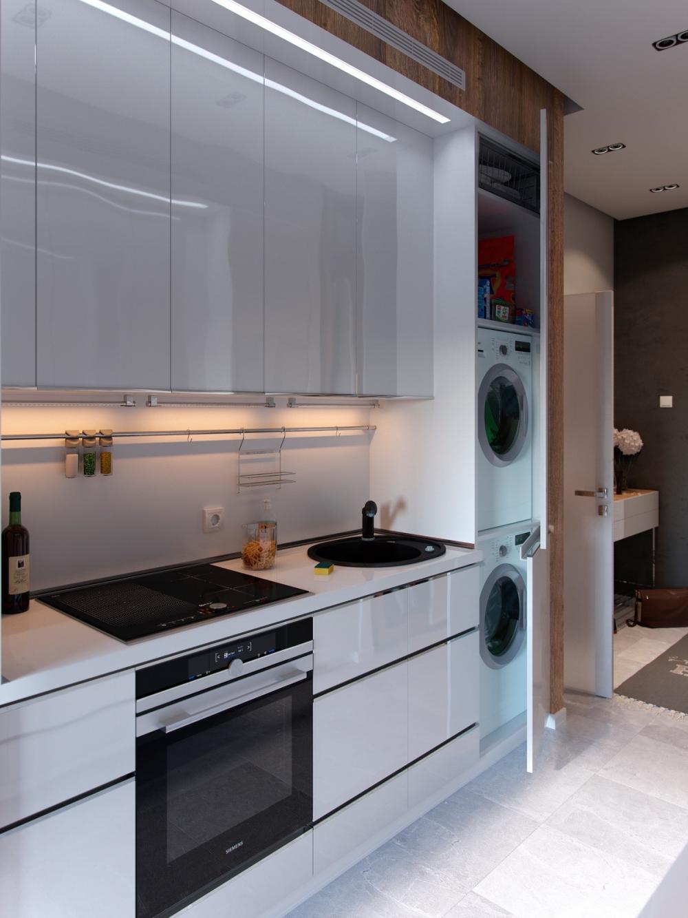 Ẩn sau cánh cửa tủ là các thiết bị máy giặt Nhà ở