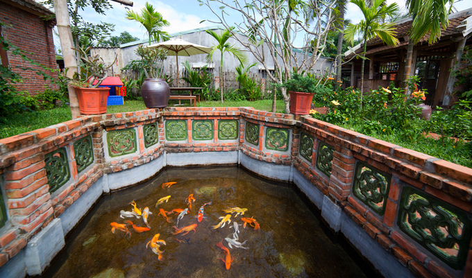 Chiếc chum, cây cau... những hình ảnh quen thuộc ở Bắc Bộ cũng xuất hiện ở đây Thiết kế nhà đẹp