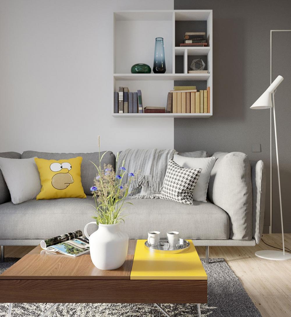 Trên nền ghế sofa màu xám, chiếc gối tựa màu vàng trở nên vô cùng nổi bật. Mảng màu vàng tươi của một phần bàn trà khiến màu sắc này được nhắc lại, trở nên sinh động hơn. ghế sofa màu xám
