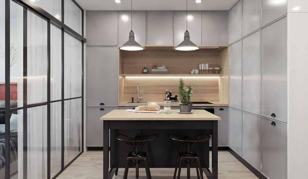 Đảo bếp được thắp sáng bằng hai chiếc đèn treo thiết kế đơn giản. đảo bếp