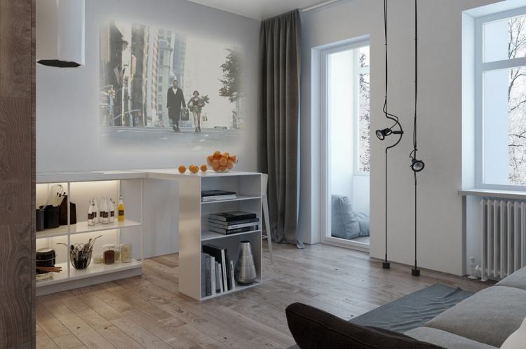 Ghế sofa màu xám êm ái đặt cạnh cửa sổ lớn tạo thành nơi tiếp khách và cũng là chỗ nghỉ ngơi của chủ nhà ghế sofa màu xám
