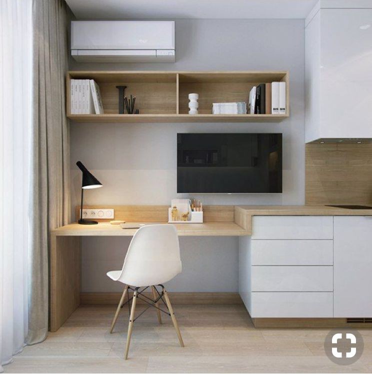 Bàn làm việc bố trí gọn trong một góc phòng bàn làm việc