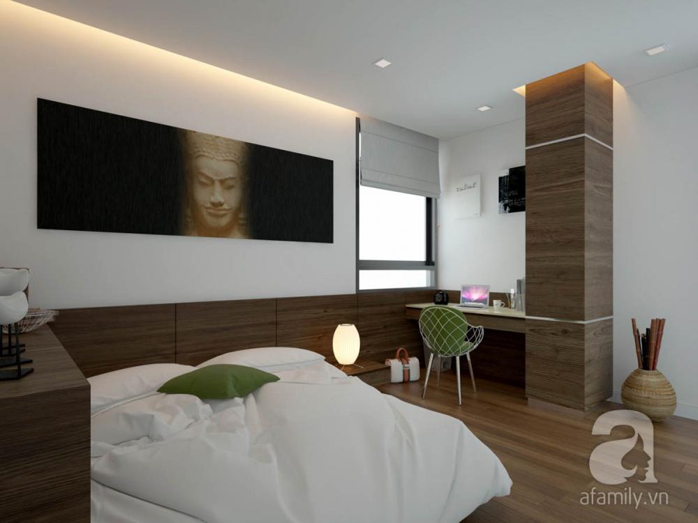 Màu sắc chủ đạo của phòng ngủ là trắng và màu gỗ óc chó của nội thất. KTS tư vấn sử dụng giường ngủ kết hợp với tap và hệ tủ để sách, décor đồng bộ giúp tiết kiệm diện tích. nội thất phòng ngủ