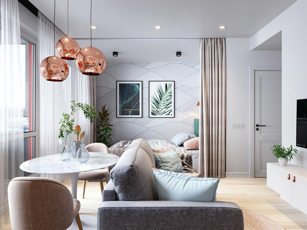 Ba chiếc đèn mặt dây chuyền bằng đồng sáng bóng giúp phản chiếu ánh sáng rất tốt, mang lại cảm giác tươi mới cho căn hộ nhỏ thiết kế căn hộ nhỏ