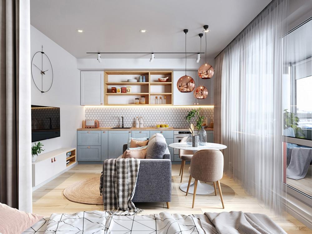 Do căn hộ có diện tích rất nhỏ nên chủ nhà bố trí sofa, bàn ăn và tủ bếp trong cùng một không gian. Để không bị rối, các chi tiết trang trí được lược giản tối đa, màu sắc cũng rất nhẹ nhàng. trang trí căn hộ diện tích nhỏ
