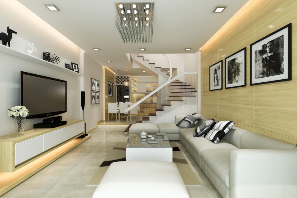Phòng khách gồm sofa và bàn trà màu sáng, đối diện là kệ ti vi, tường sau sofa ốp gỗ sồi thiết kế phòng khách