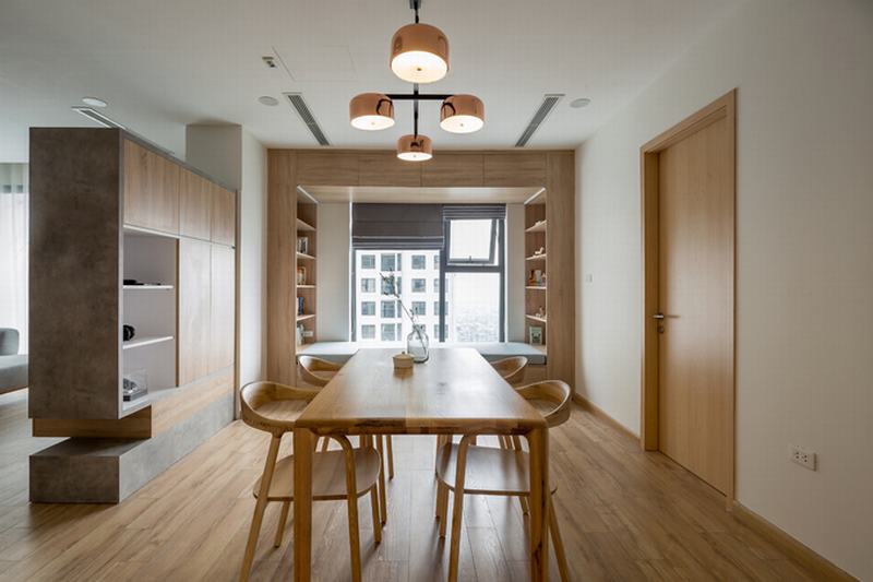 khu vực đọc sách đặt gần cửa sổ, tiếp đến là bàn ăn khu vực đọc sách