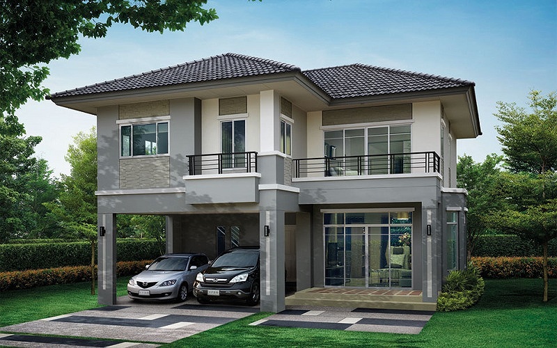 Nhà mái thái 2 tầng màu trung tính với các đường nét phào chỉ khỏe khoắn, tạo cảm giác vững chãi. Nhà mái thái 2 tầng màu trung tính